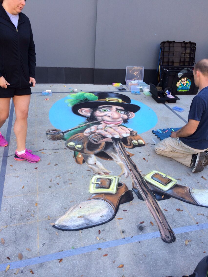 Sidewalk chalkings at Hyde park village.  Amazing how detailed these artists can get with these tools, canvas, and inspirations! Unfortunately, torrential rains next day likely cleansed the artwork.  Day before St Patrick's day 2014