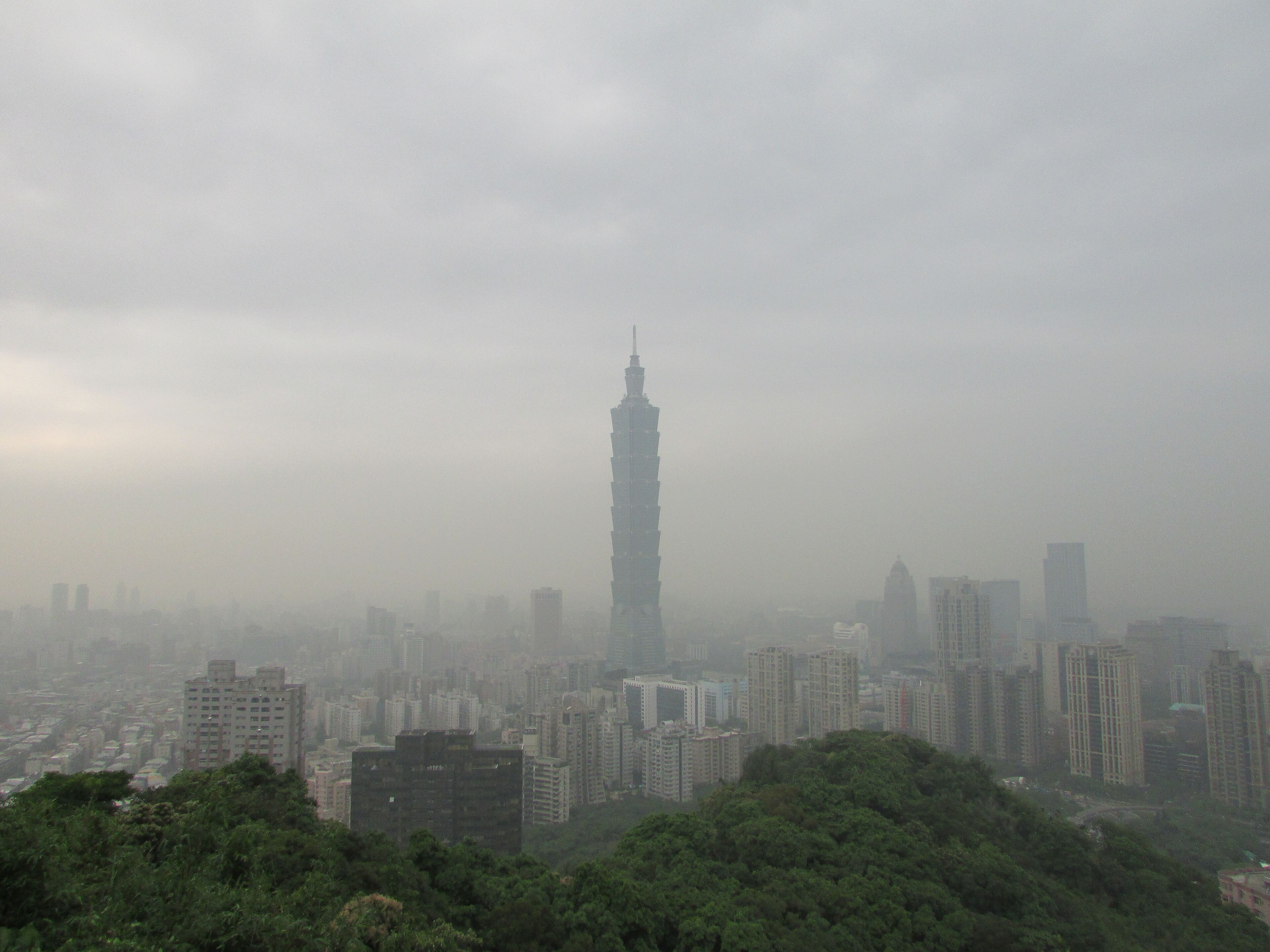 Taipei 101 from elephant mountain.The best time to hike the mountain is during late afternoon, this way you can catch the sunset as well as a daytime view and stunning nighttime view of the city,
