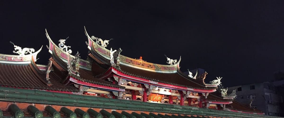 Last night we went to a Taoist Temple in Taipei.  You can see in the close up picture of people praying how they receive and answer immediately from the prayers.  After kneeling and bowing, you throw two "stones" onto the floor.  They are both crescent shaped with a sun and a moon side. If they end up both on one side, the answer is NO.  If they end up both on the other side, the answer is maybe, or not enough information.  If the end up like a ying and a yang, then the answer is YES.  I took a moment to pray, asked my question and got a ying and a yang out of the throw.  The belief is, that the result comes from within your own heart.