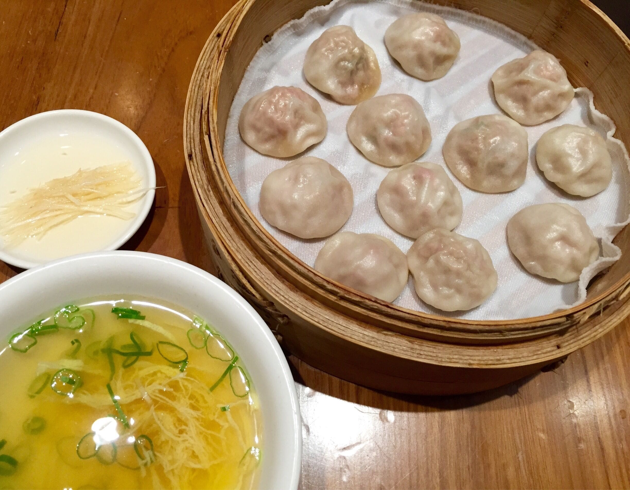Be an early bird and be at this restaurant at 10 in the morning on the weekend to avoid the hour long queue. Do order the soup dumpling that is served with a bowl of soup. Put the hot dumpling in the spoon, add some soup into the spoon and top with the vinegar ginger, just heavenly! This dumpling is smaller than the regular xiao Lon bao and serving with soup is a very traditional way and rarely done this way these days. This soup dumpling is only available at din tai fung from 10:00 to 11:30 on the weekends.