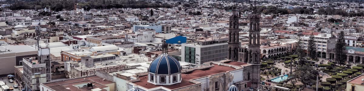 Tepic Cathedral in city centre of Tepic. State Nayarit in Mexico. Aerial drone view of Tepic and San Juan mountain.