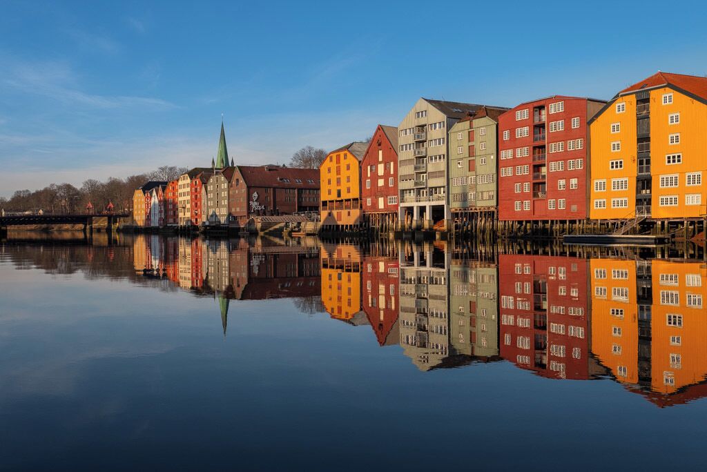 Trondheim is a city on the Trondheim Fjord, in central Norway. This is a beautiful location near the Bakke Bru Bridge overlooking and old part of town with building built on wooden stilts.