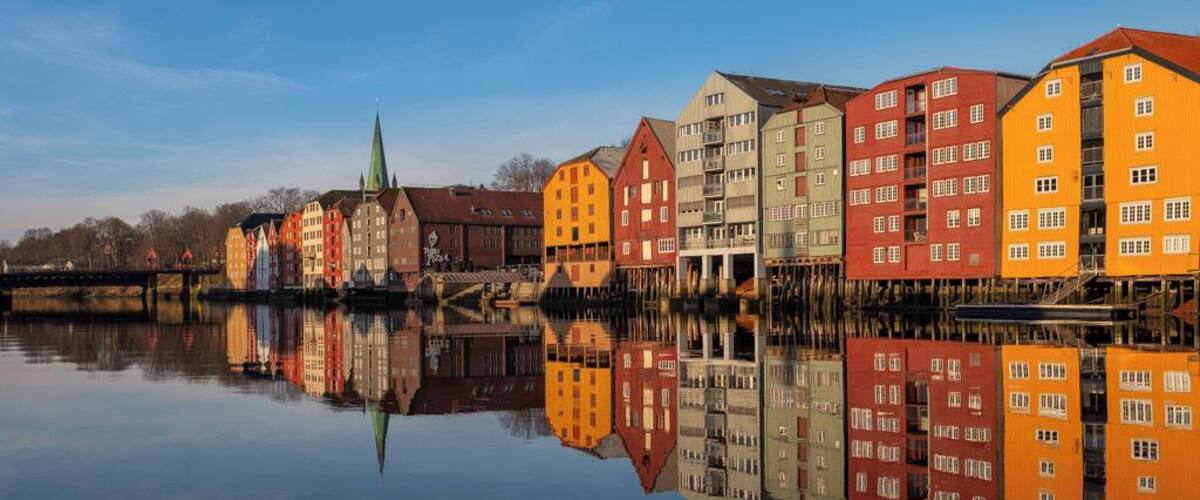 Trondheim is a city on the Trondheim Fjord, in central Norway. This is a beautiful location near the Bakke Bru Bridge overlooking and old part of town with building built on wooden stilts.