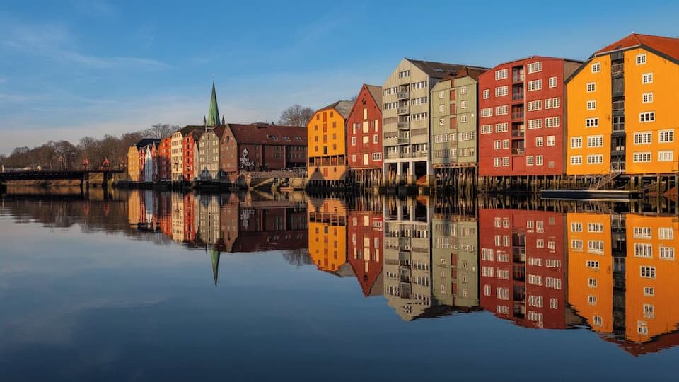 Trondheim is a city on the Trondheim Fjord, in central Norway. This is a beautiful location near the Bakke Bru Bridge overlooking and old part of town with building built on wooden stilts.