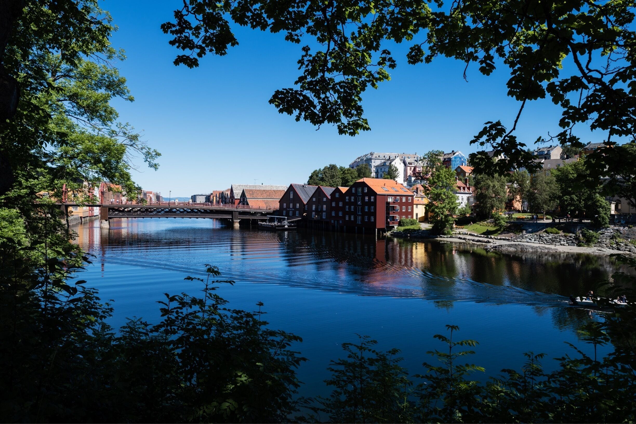 Trondheim is absolutely gorgeous. This walk by the river side is really nice! 
One day was enough to explore the city Center. 
