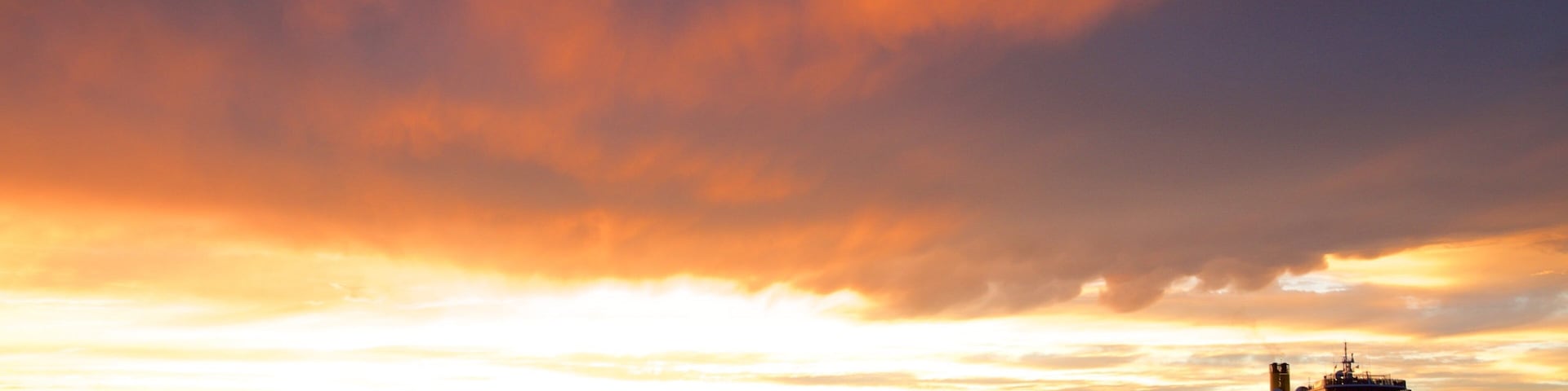 Trieste which includes a sunset, cruising and general coastal views