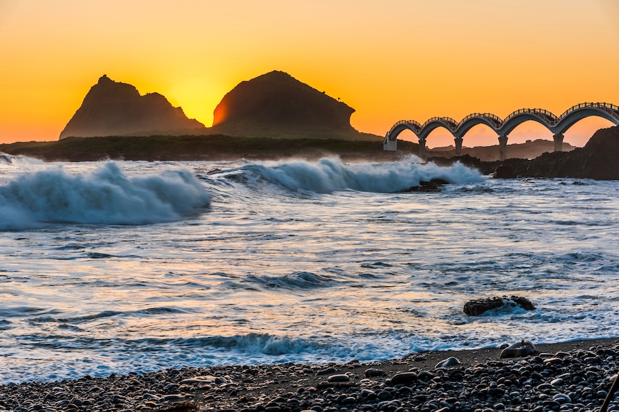 Landscape View Of The Beautiful Eight Cross-Sea Arch Bridge Across Pacific Ocean Coast At Sanxiantai Islet (Three Saints Island), East Coast National Scenic Area, Taitung, Taiwan.