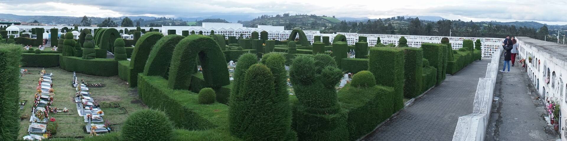 Cementerio de Tulcan Cemetery with green hedges and graves in Tulcán, Ecuador.