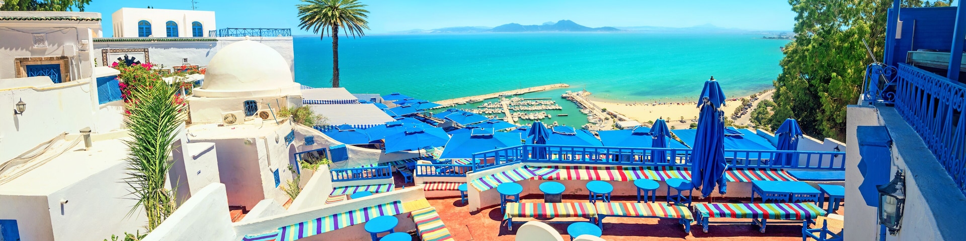 Panorama with picturesque open cafe in Sidi Bou Said town. Tunisia, North Africa