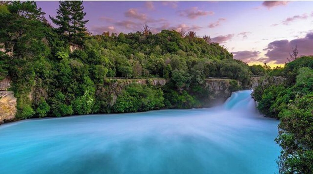 Huka Falls is one of the most powerful waterfalls we've ever seen. Every second up to 220,000 litres of water gushes through the gorge. Besides that the best time to visit, in our opinion, is when the sun is about to set and the sky is painted in purple! #HukaFalls #LongExposure #Waterfall #Sunset #Nature #NewZealand