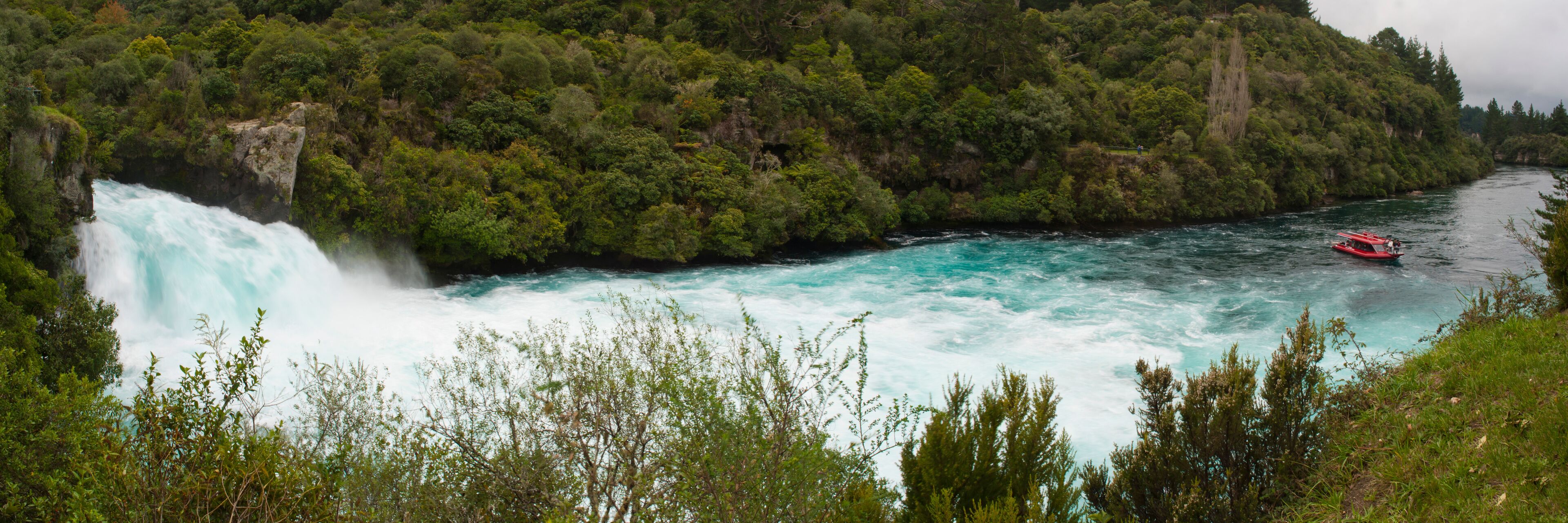 Panoramic Photo of Tourists on a Boat Tour at Huka Falls, Taupo, Waikato Region, North Island, New Zealand