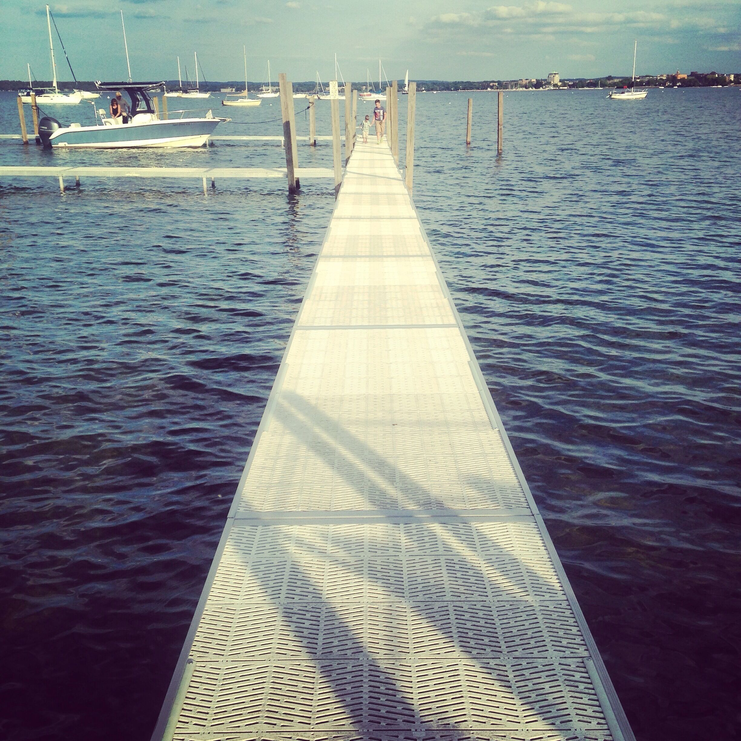 Gorgeous View from Apache Trout Grille in Traverse City. MI!  Excellent place for a #WeekendGetaway with the ladies!   Grab a drink or two outside on the picnic tables or at the water while you wait for your table!  

#girlsweekend #upnorth #mittenlove #girlsjustwannahavefun #travel #diagnosiswanderlust #travelblogger #summerbucketlist #TC #traversecity #wanderlust  #waterlust #puremichigan #DowntownTC 
#weekendgetaway
