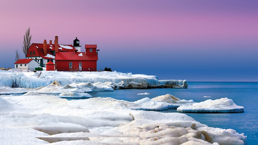 Traverse City showing general coastal views, a lighthouse and snow