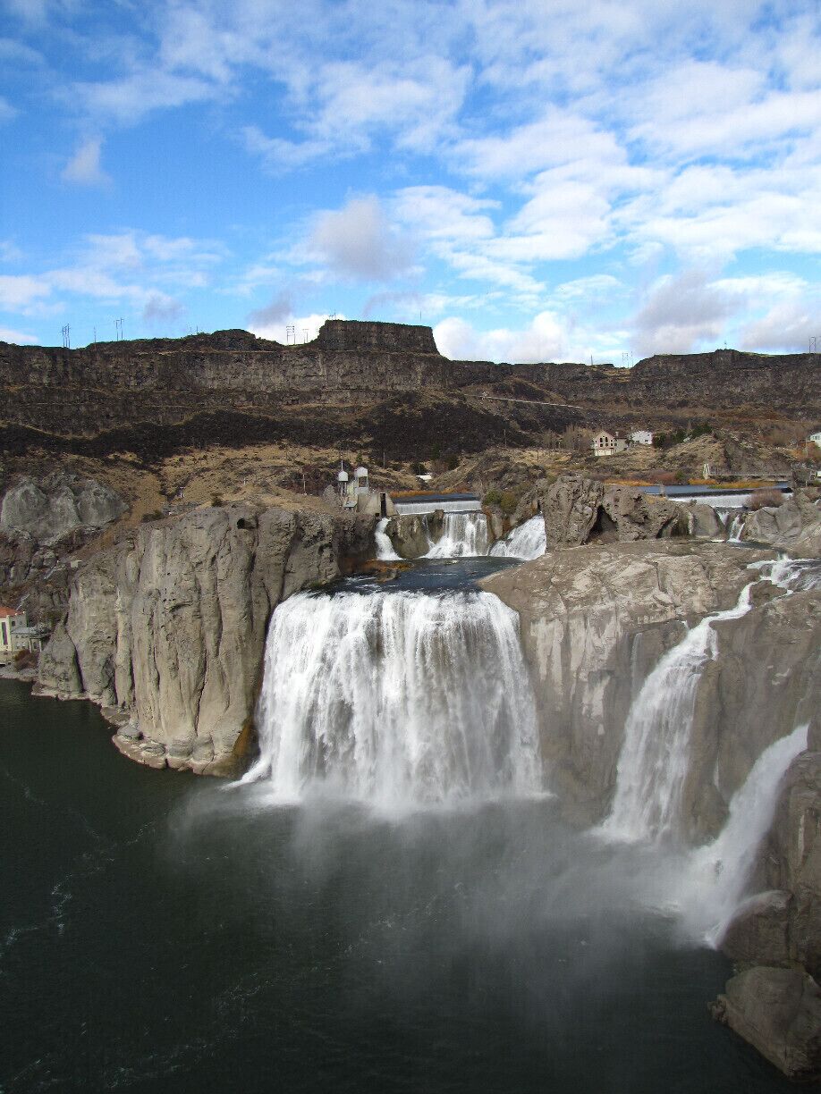 Driving though the town of Twin Falls, you would never know that this was even here. Its flat, dry, high desert type country, then you drop down into this canyon and arrive at the falls. Beautiful!!! But VERY windy!!