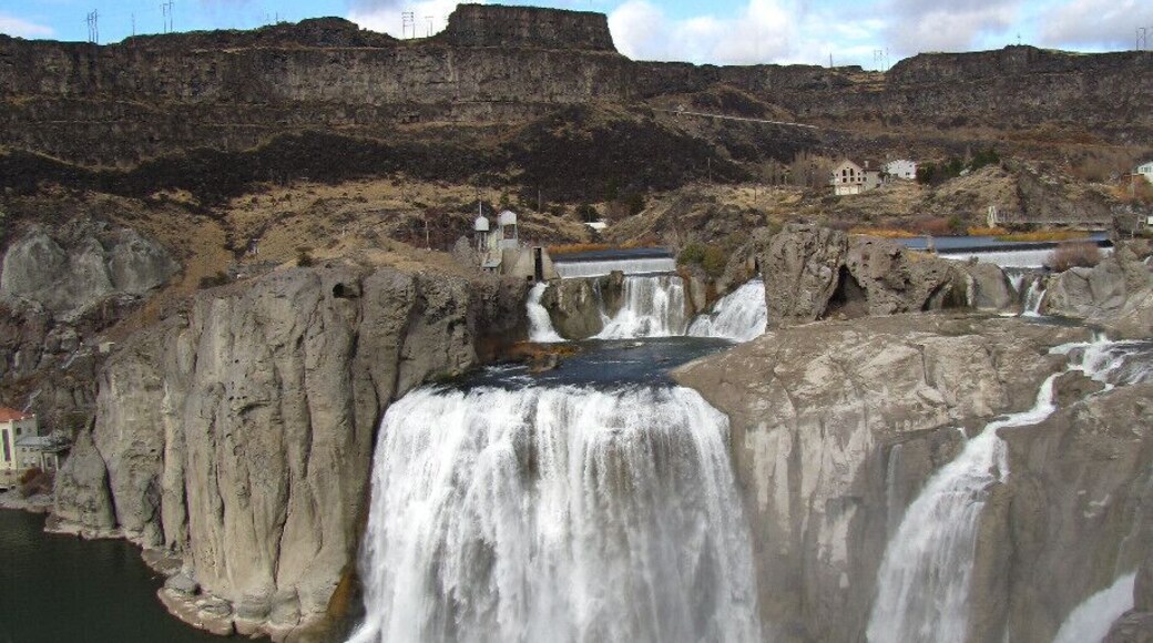 Driving though the town of Twin Falls, you would never know that this was even here. Its flat, dry, high desert type country, then you drop down into this canyon and arrive at the falls. Beautiful!!! But VERY windy!!