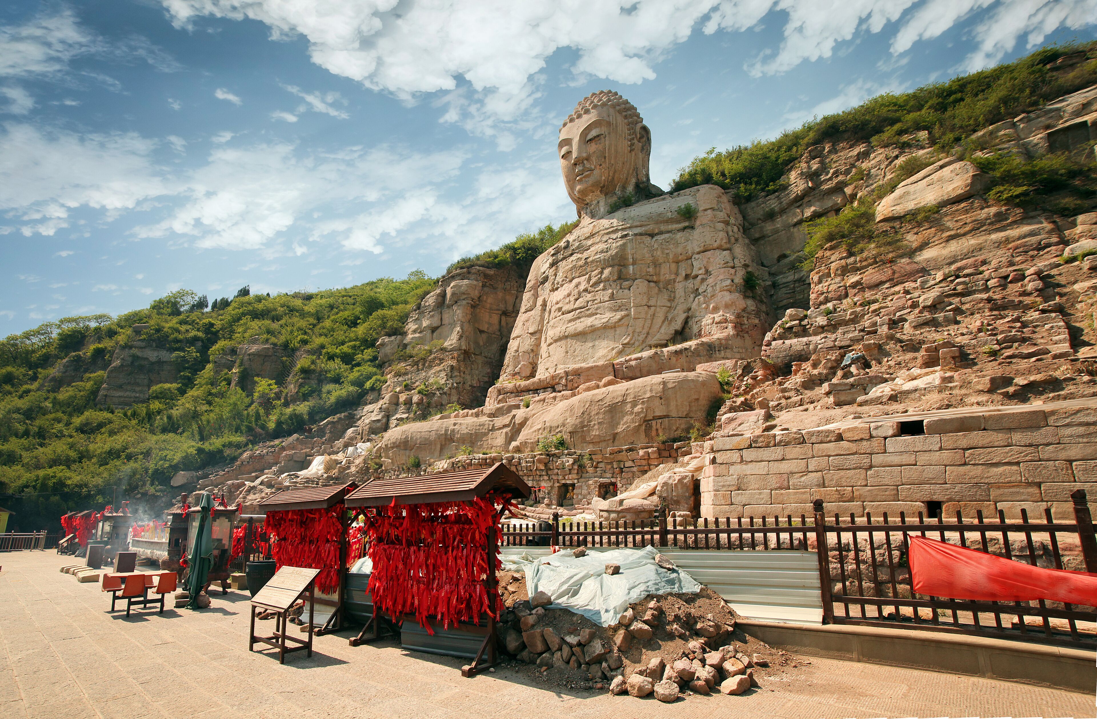 Stone carving Mengshan Buddha. It was built in A.D. 551. The head was rebuilt in After A.D.2000. The Buddha is located Southwest suburbs of Taiyuan, Shanxi, China.