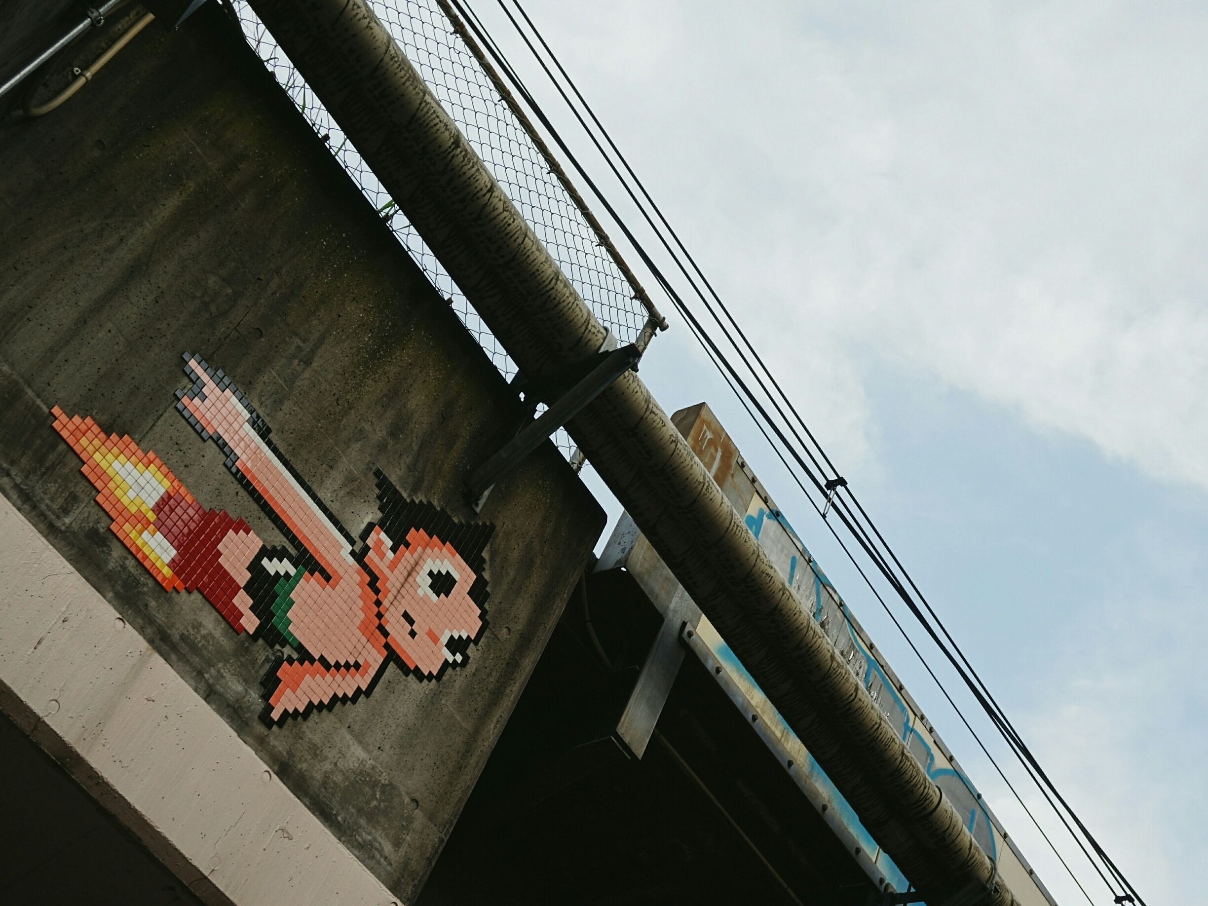 This Astro Boy (or Tetsuwan Atomu in Japanese) mosaic street art, by French urban artist Invader, can be found right above a tunnel entrance.

Closest Station: Shibuya Station on the JR Yamanote Line, ect.

#graffiti #streetart #art