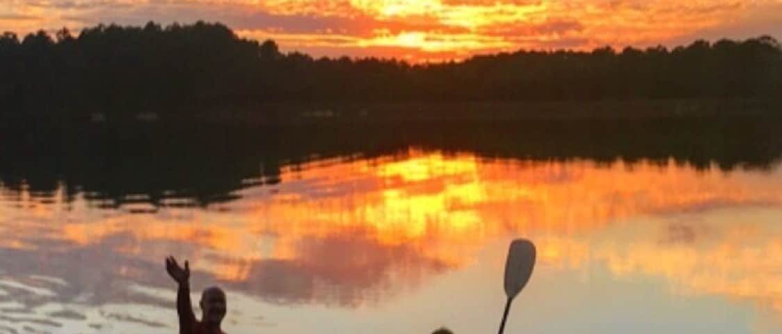 the sunset flows all over the lake.