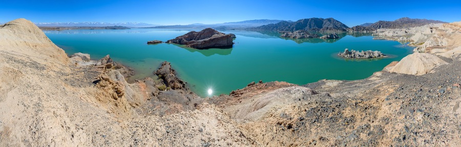 Dry desert badlands at the Lago Cuesta del Viento reservoir in San Juan, Argentina