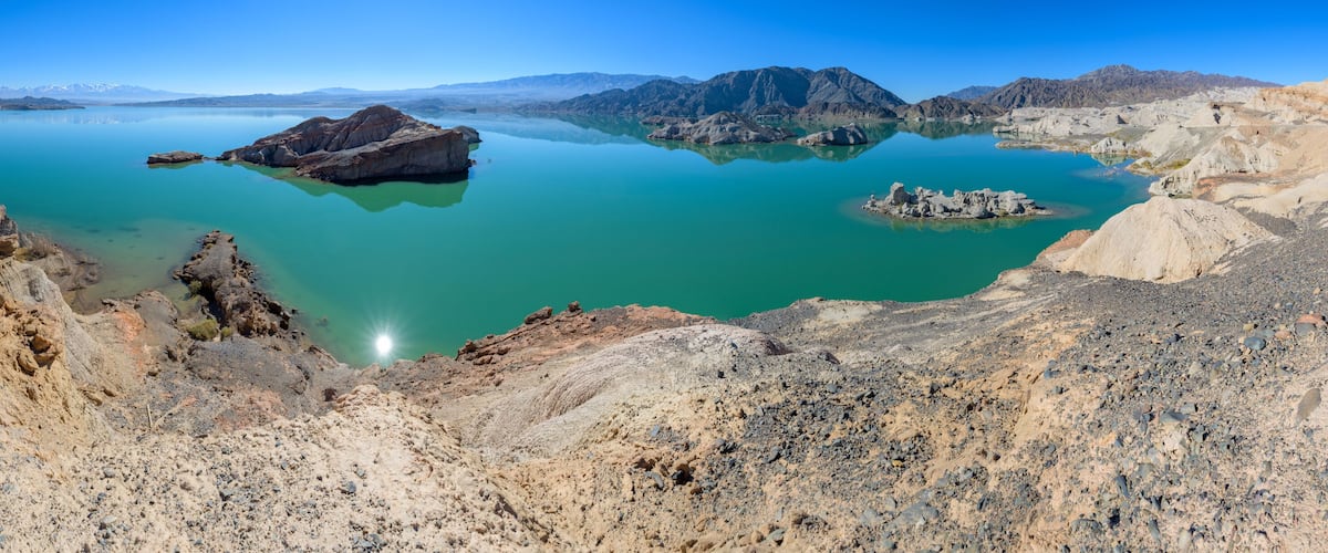 Dry desert badlands at the Lago Cuesta del Viento reservoir in San Juan, Argentina