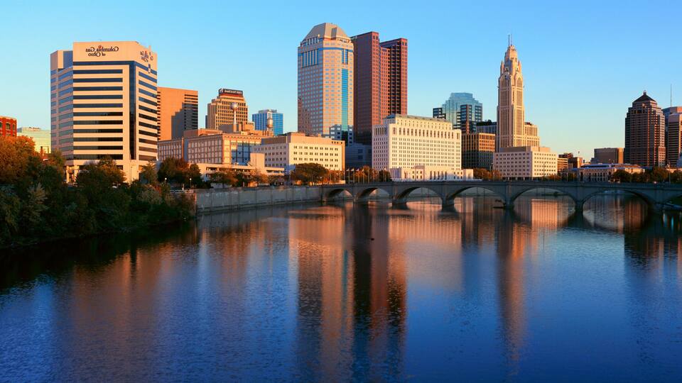 Scioto River and Columbus Ohio skyline, with setting sunlight