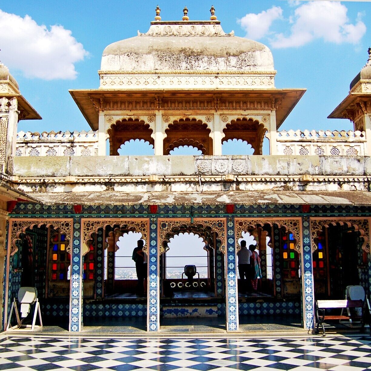 The Udaipur City Palace makes for a wonderful afternoon. We leisurely snaked our way through a myriad of courtyards and pavilions and ogled the city below through clusters of colorful panes in the verandas. The opulent rooms are feasts for the eyes--swathed in color, ornate wood and stonework and studded with gems and glittering glass. Entry fee is around 50 rupees with an additional camera fee. #Udaipur #India #palace #historic