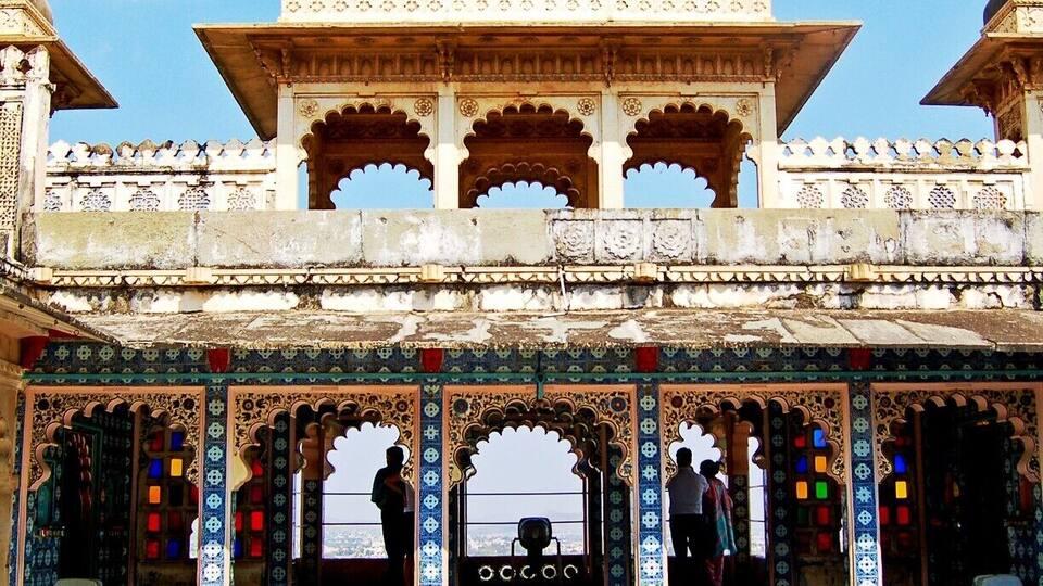 The Udaipur City Palace makes for a wonderful afternoon. We leisurely snaked our way through a myriad of courtyards and pavilions and ogled the city below through clusters of colorful panes in the verandas. The opulent rooms are feasts for the eyes--swathed in color, ornate wood and stonework and studded with gems and glittering glass. Entry fee is around 50 rupees with an additional camera fee. #Udaipur #India #palace #historic