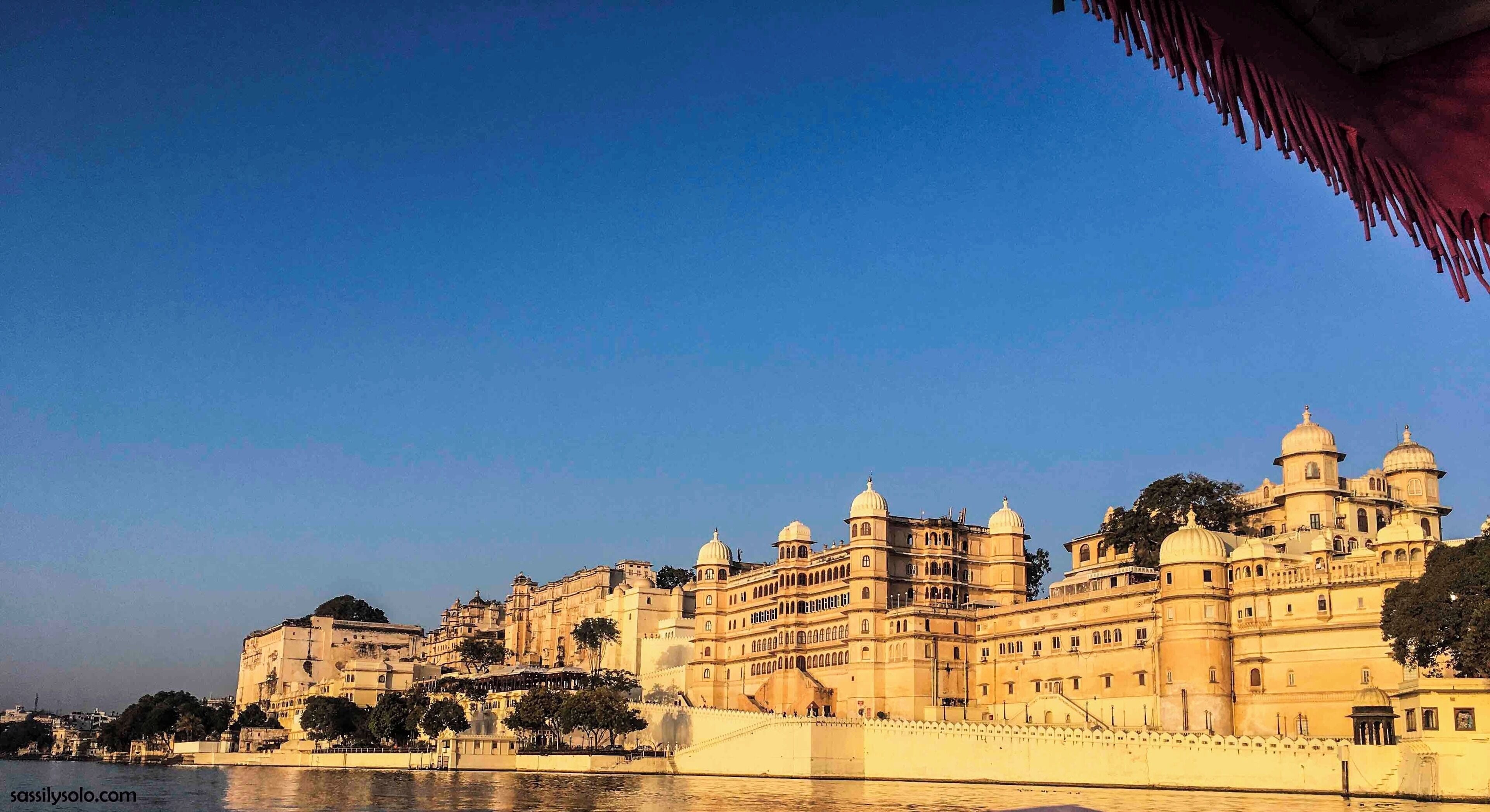 One of the most-visited tourist attractions of Udaipur is the City Palace. Its striking grandeur has already earned it the title of one of most beautiful places for destination weddings. ❤️

Of the many things I loved about Udaipur, the one topping the list was the City Palace. Now, a month later, I still cannot get over how stunningly grand it looked standing ashore the Lake Pichola. Despite the heavy tourist footfall, I’d recommend it to anyone visiting the city, particularly during the late afternoon, making way for a perfect evening at the lake beside.

#traveltales #citypalace #udaipur #rajasthan #india #solotravel #sassilysolo #canonshots #lakepichola #royalty #palaces