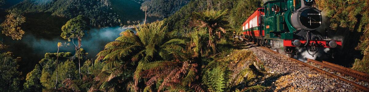 West Coast Tasmania which includes tranquil scenes and railway items