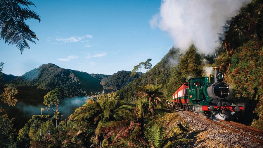 West Coast Tasmania which includes tranquil scenes and railway items