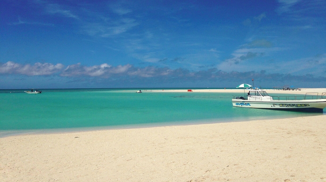 white sand, clear water, blue skies