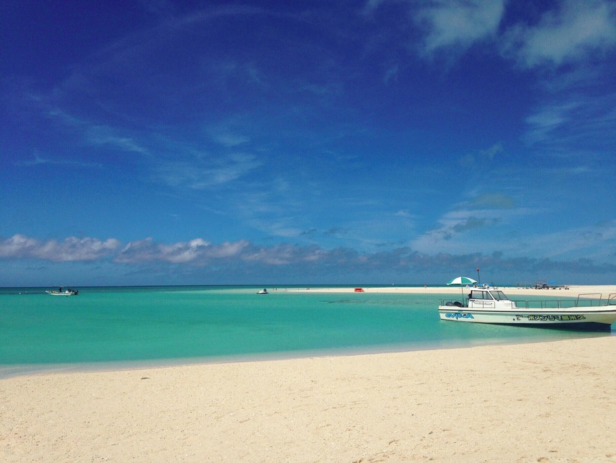 white sand, clear water, blue skies