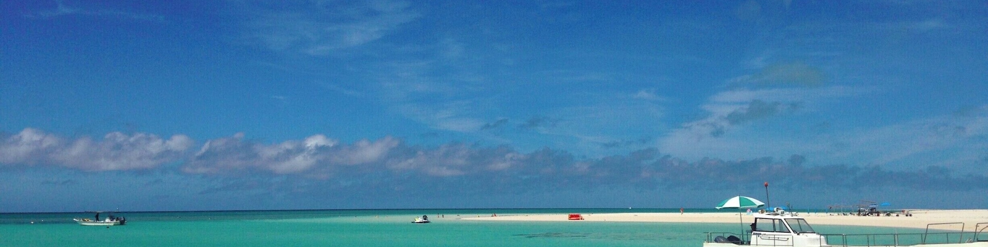 white sand, clear water, blue skies