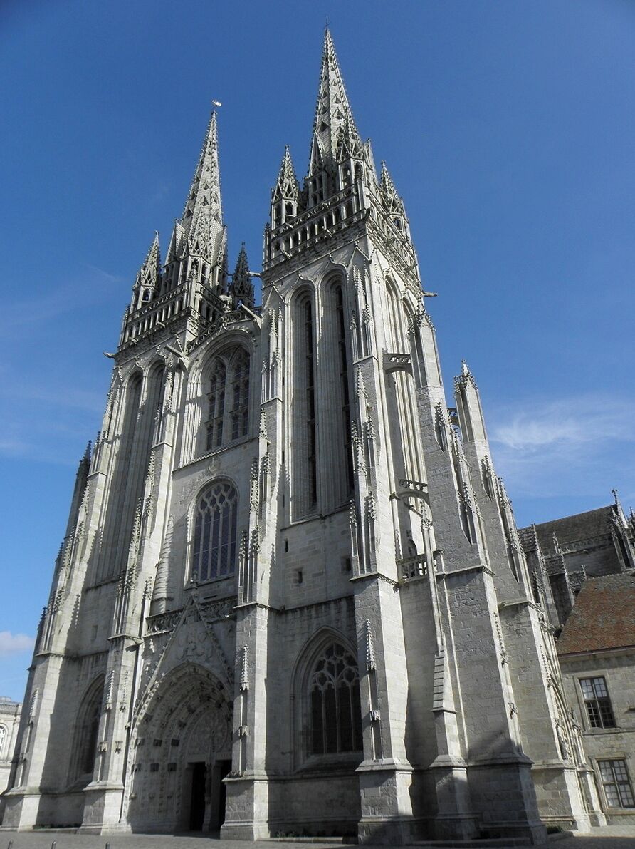 A Gothic cathedral with pointed spires and intricate stonework.