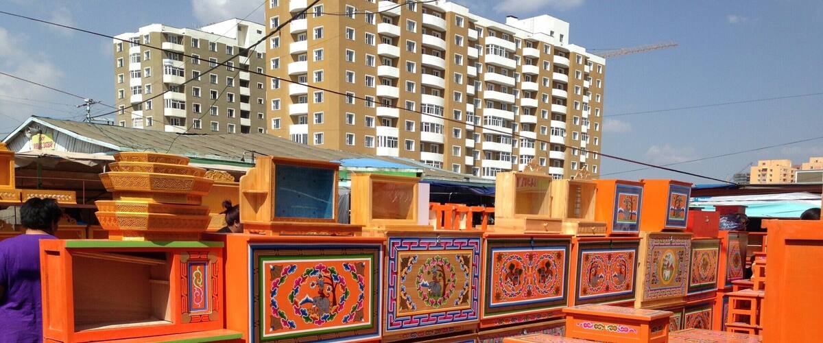 Ger furniture at the Narantuul market. The furniture is light for easy lifting when the gers are seasonally moved. This bright orange is definitely the traditional colour. I wonder why? #markets #colorful