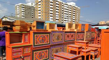 Ger furniture at the Narantuul market. The furniture is light for easy lifting when the gers are seasonally moved. This bright orange is definitely the traditional colour. I wonder why? #markets #colorful