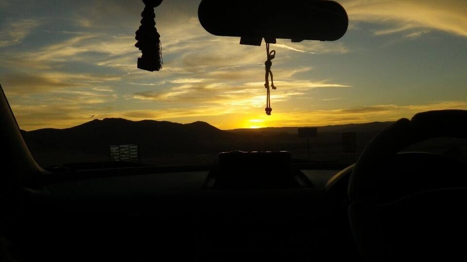 Somewhere off the beaten path on the Mongolian steppe, driving on a ramshackle road with a hired driver. With a broad sky and gorgeous sunset above, sometimes it doesn't really matter where you are going...what matters is where you are. #TroverDetour