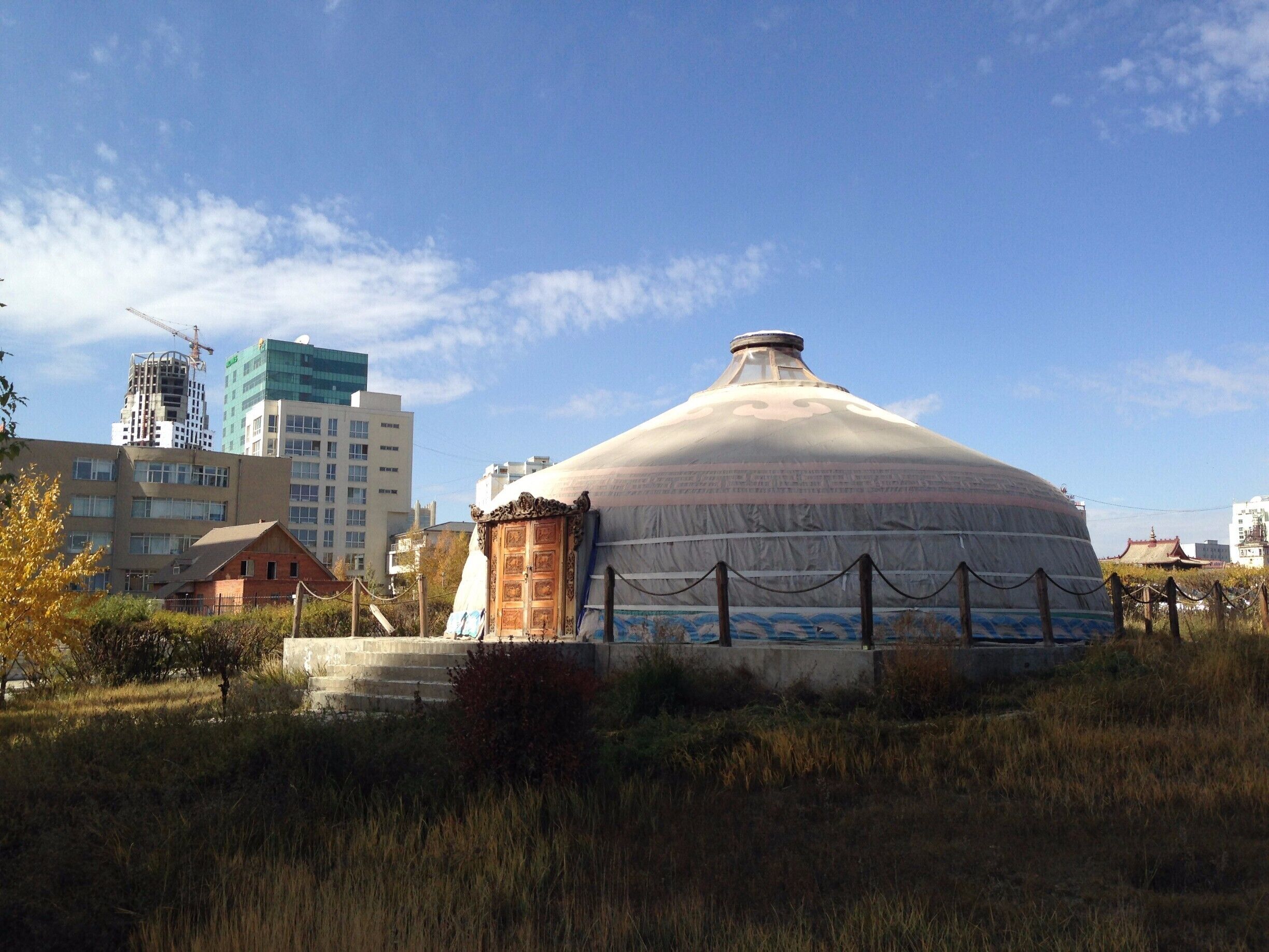 The Wedding Palace is not a religious place. It's where many people get married before moving on to a reception centre. The ger in the grounds is a symbol of the nomadic culture. A ger door will always face south. #ger #Details The strong Mongolian light draws the eye to the wedding ger. In a small area on downtown Ulaanbaatar you can capture the old and the new in architecture. 