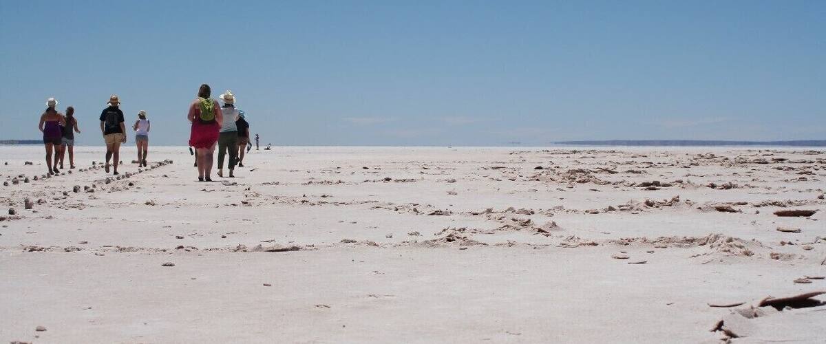Lake Hart has something dramatic. I loved exploring this salt lake. It almost seems infinite even though it's one of the smaller ones in Australia. It's right beside the Stuart highway, so easy to go to. For more check out http://prettypacked.wordpress.com/2014/07/02/off-to-the-never-never-must-sees-on-the-road/
