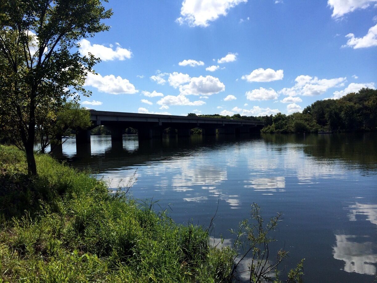 Highway bridge over the Cedar River. This park is an expanse of wildlife and nature within the Waterloo-Cedar Falls metro area.