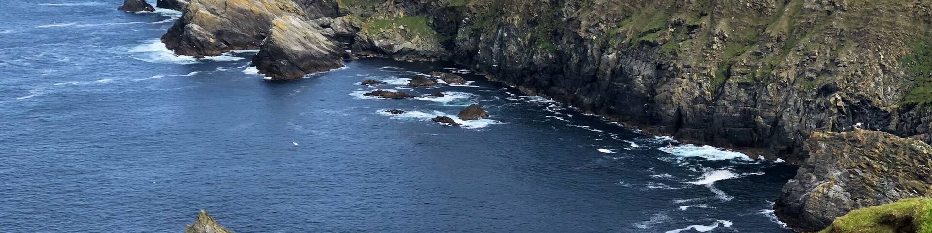 Two mile hike along boardwalks over heather and peat moss to cliffs overlooking Muckleflugga lighthouse. Spectacular views.