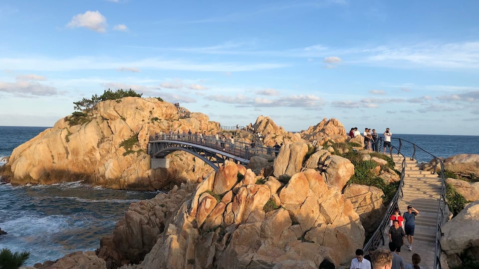 Walk to the very end of Ilsan via bridges and rocks.
