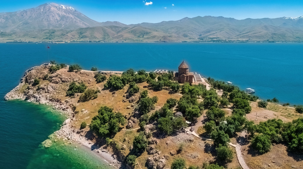 Akdamar Island and the view of the church on Mount Suphan. Aerial view of the church on the island with a drone. Van, Turkey.