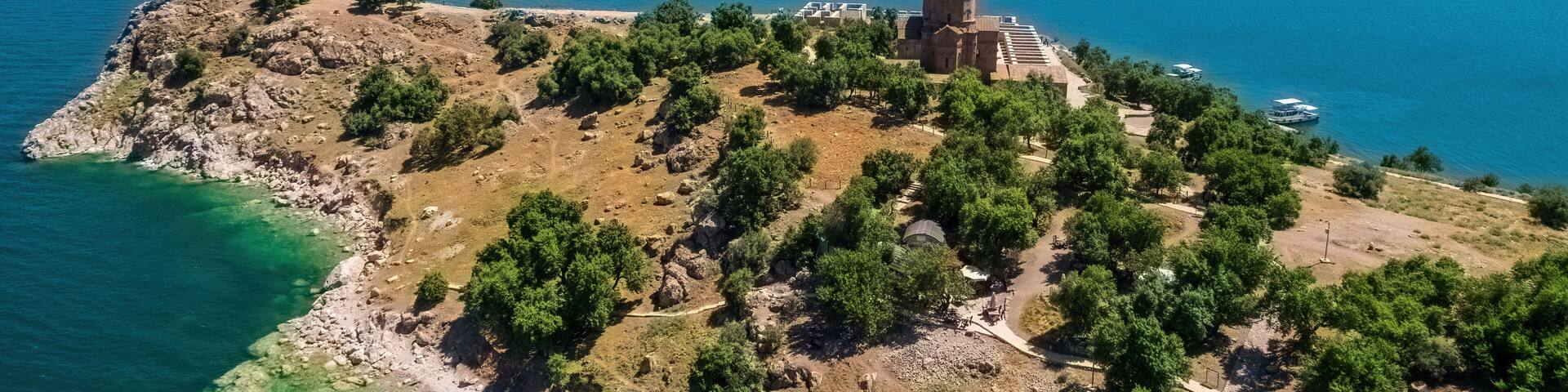 Akdamar Island and the view of the church on Mount Suphan. Aerial view of the church on the island with a drone. Van, Turkey.