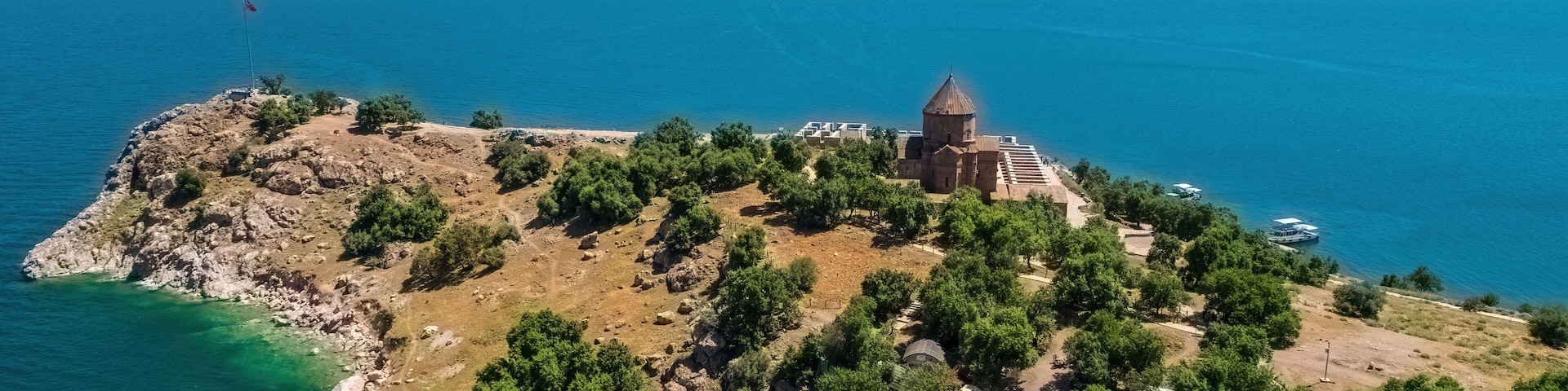 Akdamar Island and the view of the church on Mount Suphan. Aerial view of the church on the island with a drone. Van, Turkey.