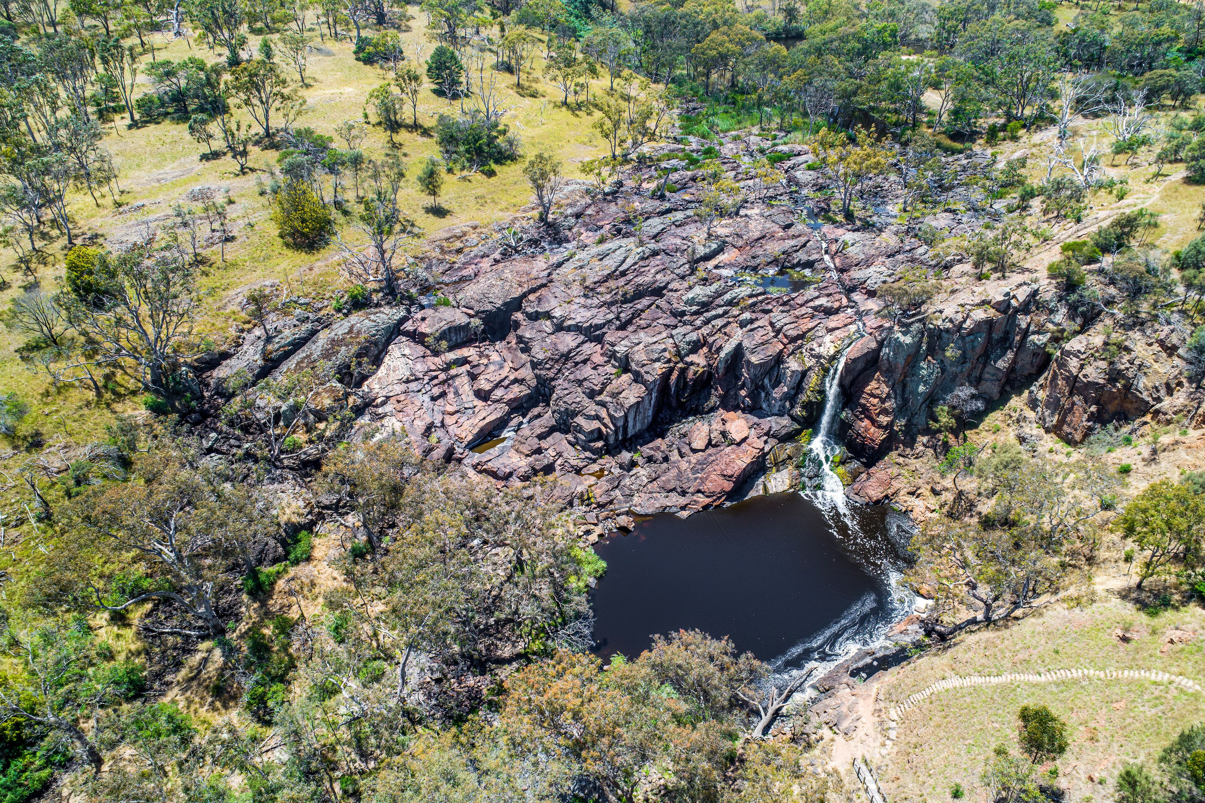 Looking down at beautiful Nigretta Falls in Victoria, Australia - aerial view
