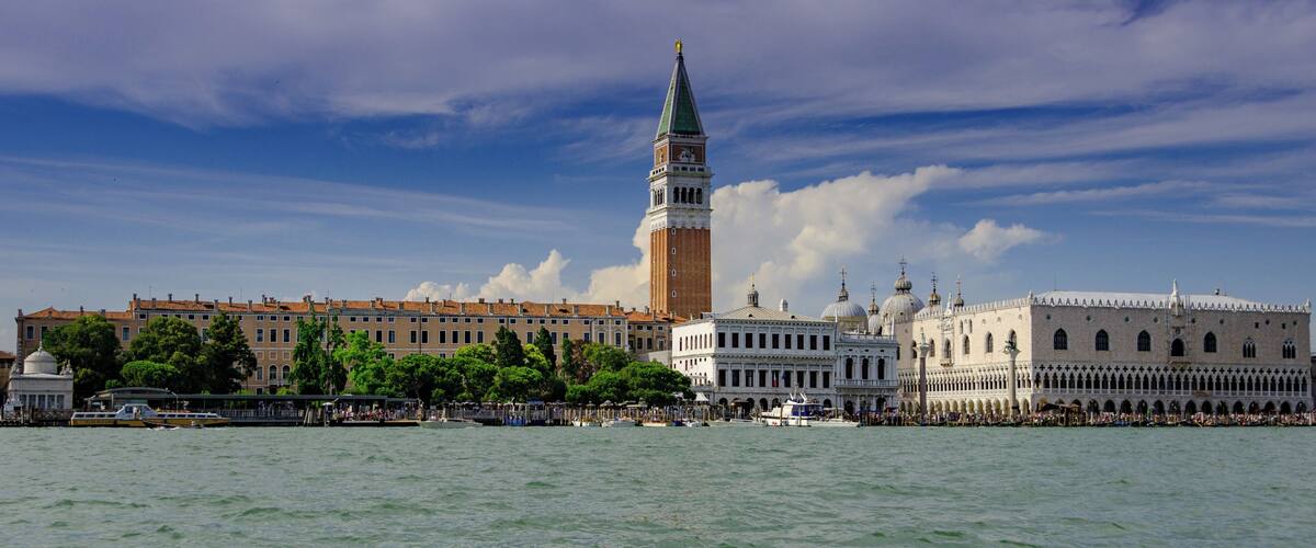 View of Campanile and Doge’s Palace in St. Mark’s Square from the lagoon.  Venice joined the list of UNESCO World Heritage Sites in 1987.