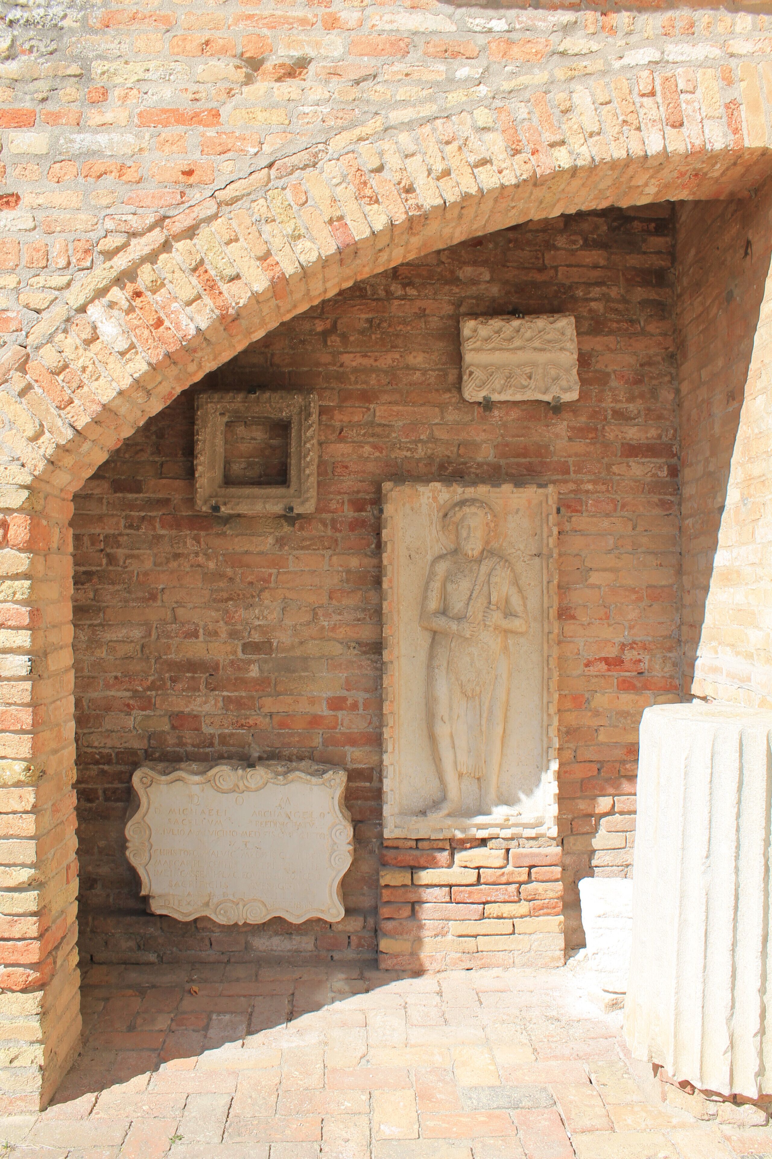 A cute little sunny island, covered in flowers and interesting little things to see like this wall! 