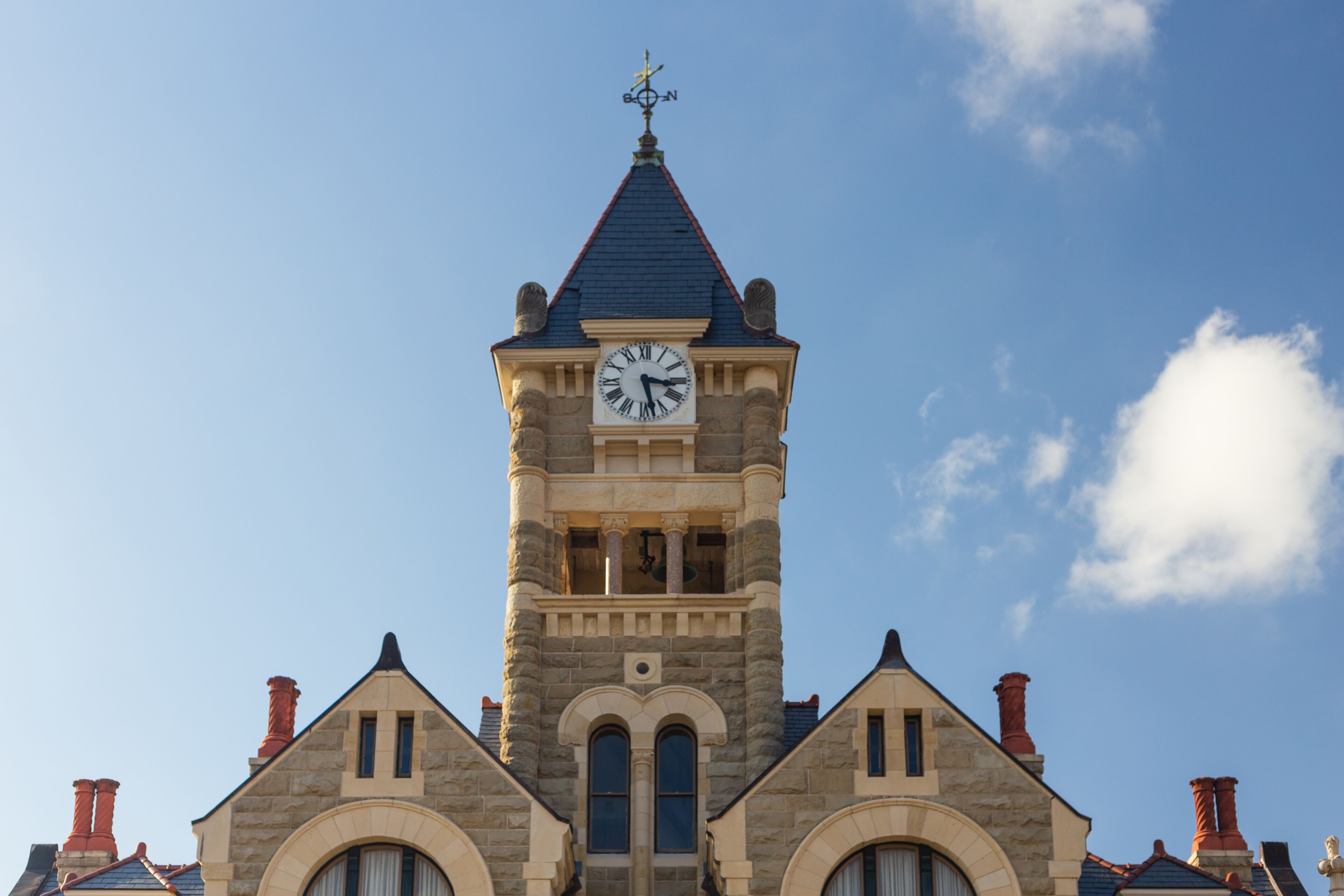 Built in 1892 of Texas. limstone, the Victoria County Courthouse is a Romanesque Revival style designed by J. Riely Gordon