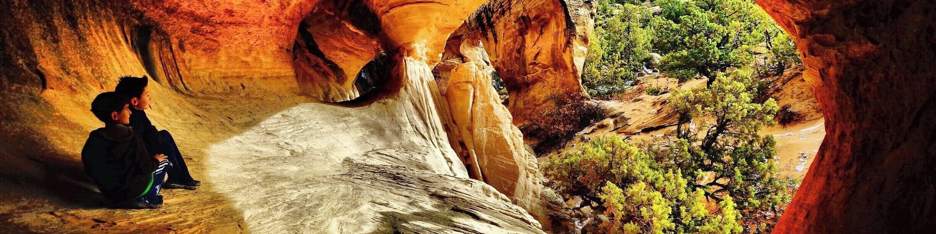 You can't tell in the photo, but we got caught in a sleet storm while we were hiking to these arches. We were taking cover in this alcove when I noticed what an awesome photo it would be of my boys.
https://www.facebook.com/LifeRidingShotgun